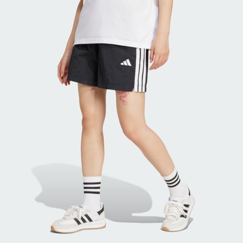 Essentials 3-Stripes Lifestyle Woven Shorts | Adidas | Women |