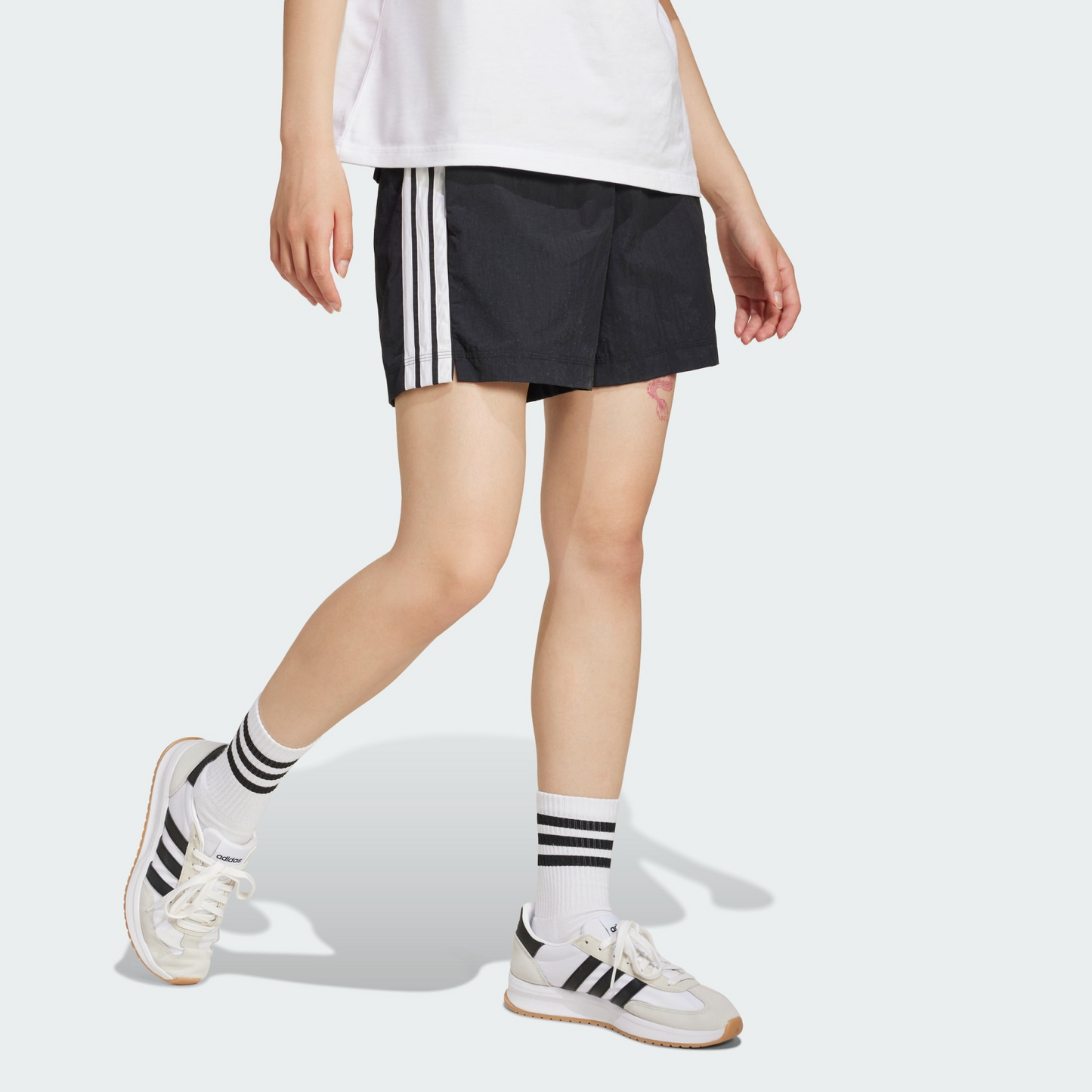 Essentials 3-Stripes Lifestyle Woven Shorts | Adidas | Women |